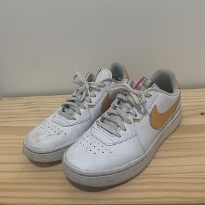 Nike sneakers with yellow details